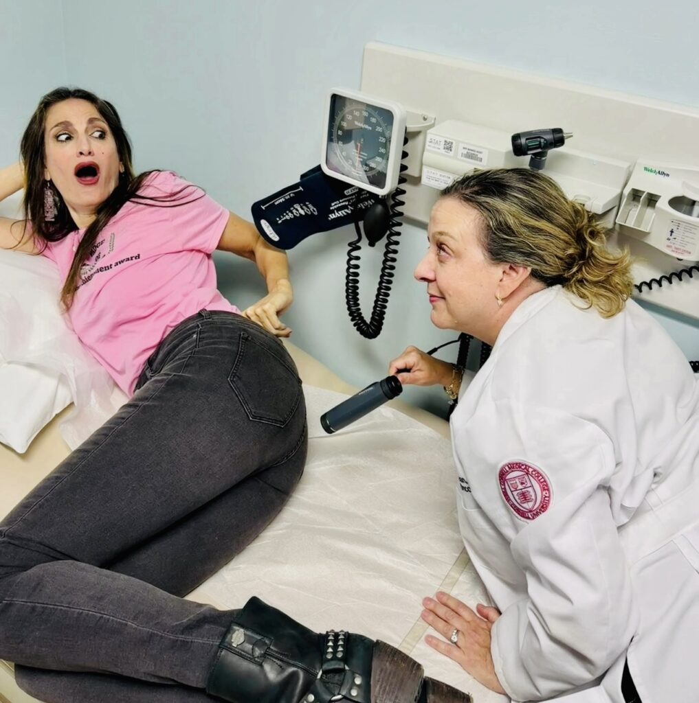 Doctor doing fake exam on Irene Bremis.